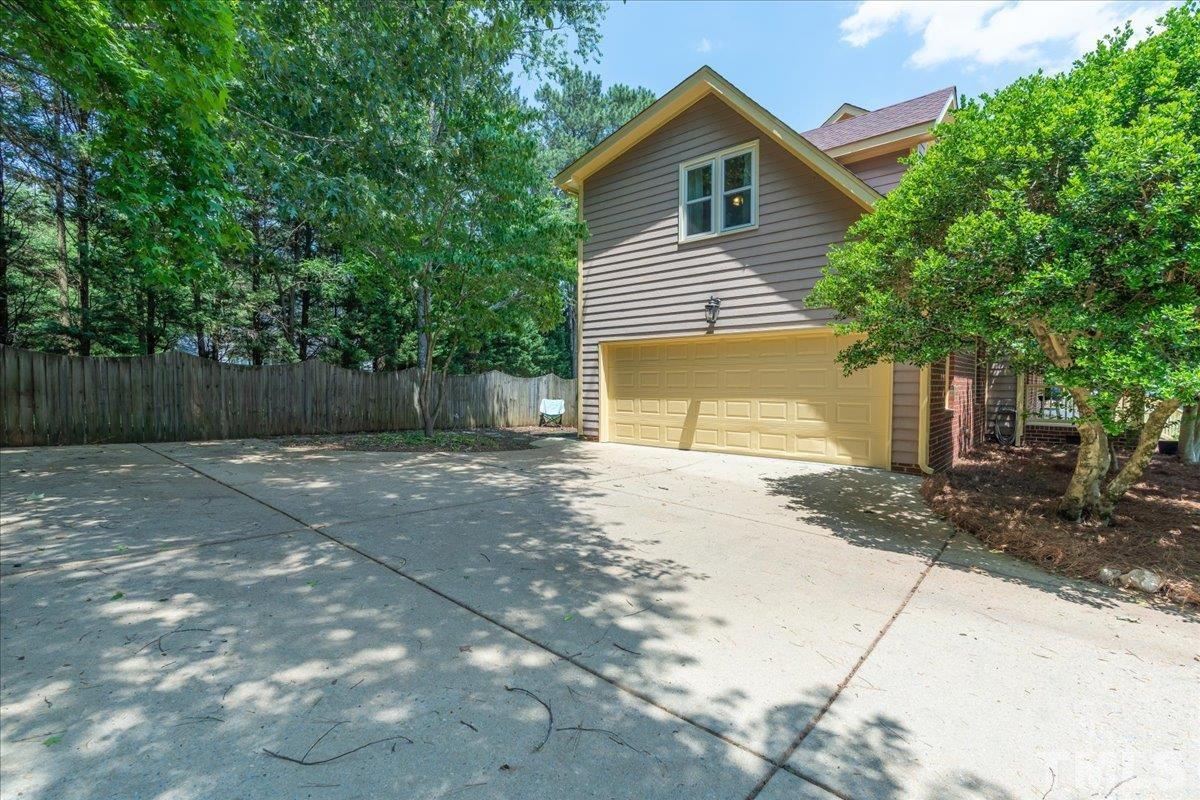 908 Broadhaven Drive Raleigh, NC 27603 - Photo 33 of 33 a front view of a house with a yard