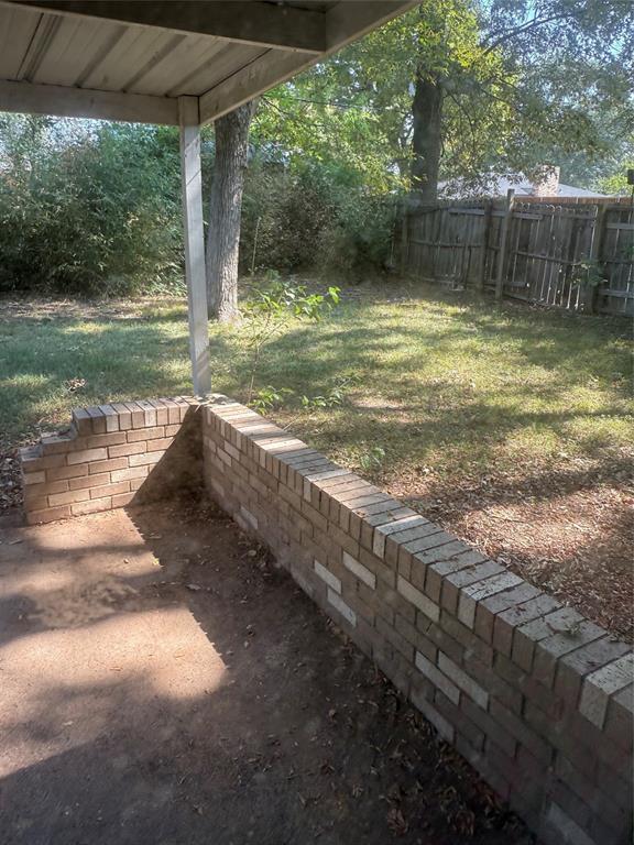 2995 Carson Lane Paris, TX 75460 - Photo 7 of 10 a view of a yard with a fountain