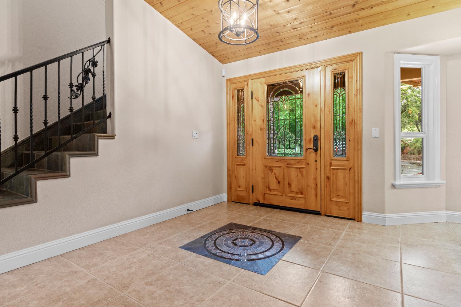 7396 Callison Road Penryn, CA 95663 - Photo 12 of 99 Inside front door and stairs to upstairs bedrooms