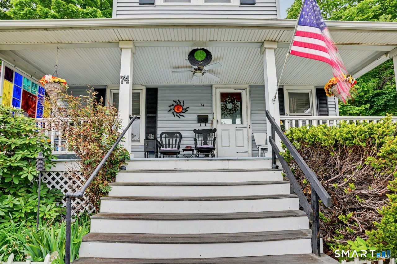 74 Maple Street Seymour, CT 06483 - Photo 35 of 40 a view of entryway with a flower garden