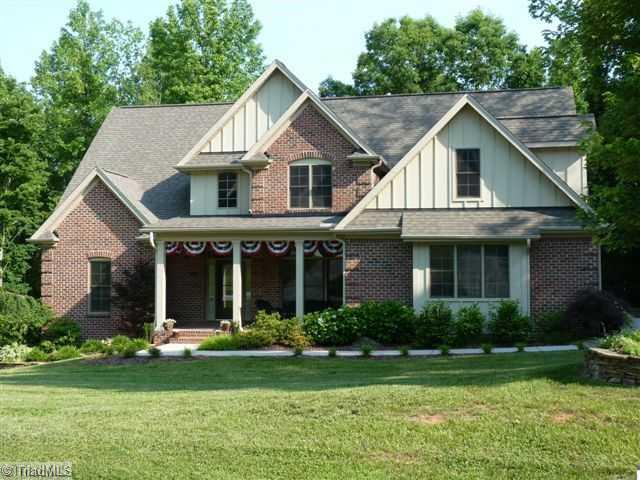 8437 Alice Player Drive Oak Ridge, NC 27310 - Photo 1 of 16 Exterior Front.