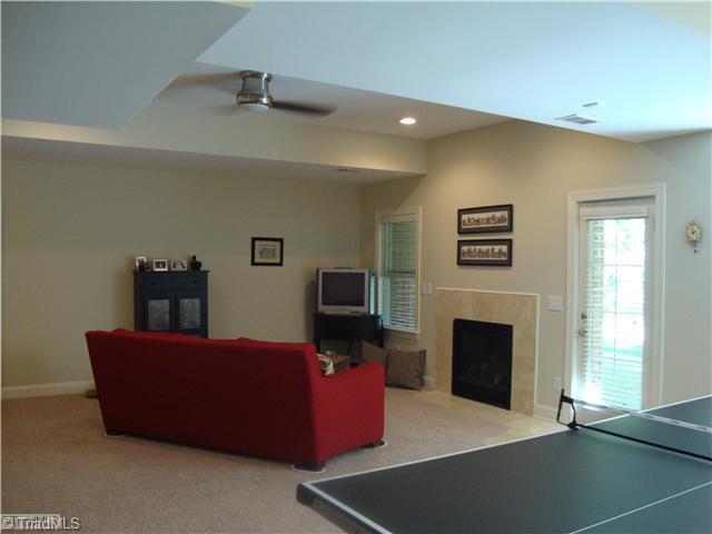 8437 Alice Player Drive Oak Ridge, NC 27310 - Photo 14 of 16 Playroom.