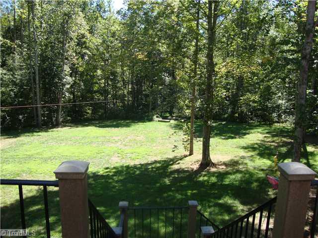 8437 Alice Player Drive Oak Ridge, NC 27310 - Photo 15 of 16 Patio/Deck.