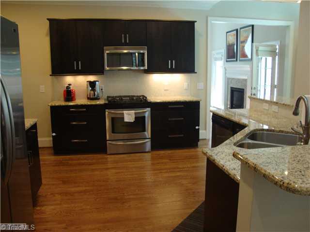 8437 Alice Player Drive Oak Ridge, NC 27310 - Photo 3 of 16 Kitchen.
