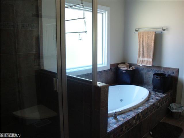 8437 Alice Player Drive Oak Ridge, NC 27310 - Photo 10 of 16 Master Bath/Spa.