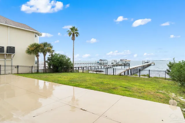 a view of house with yard