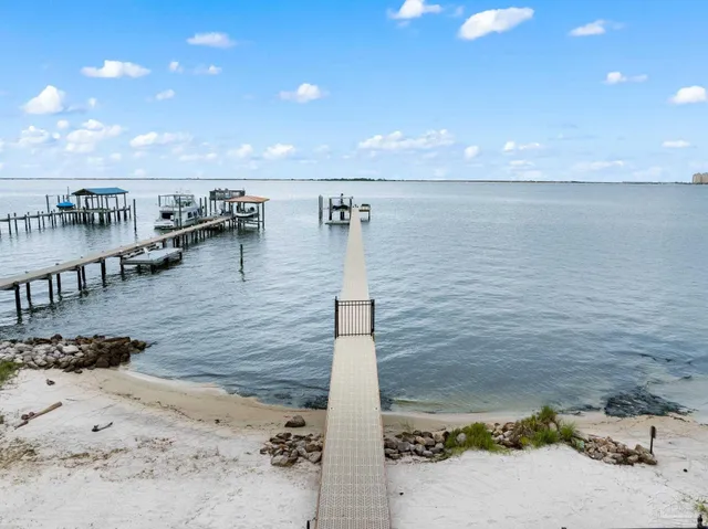 a view of a lake with a house