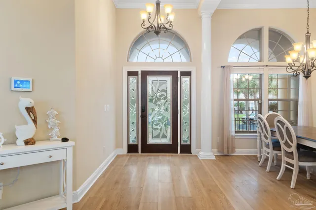 a view of a livingroom with furniture and window