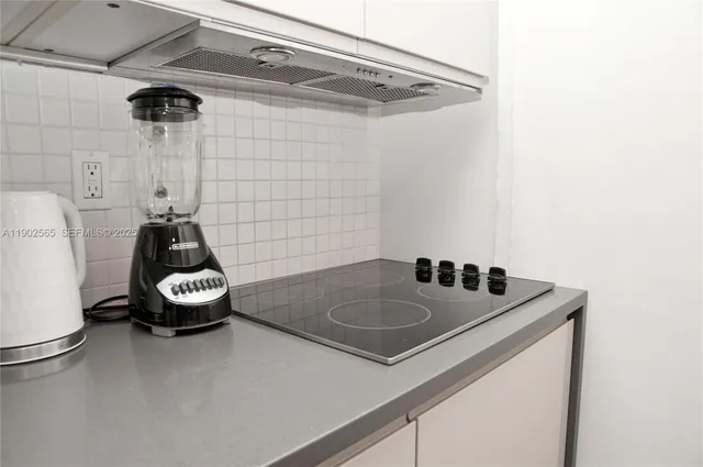a bathroom with a sink and toilet
