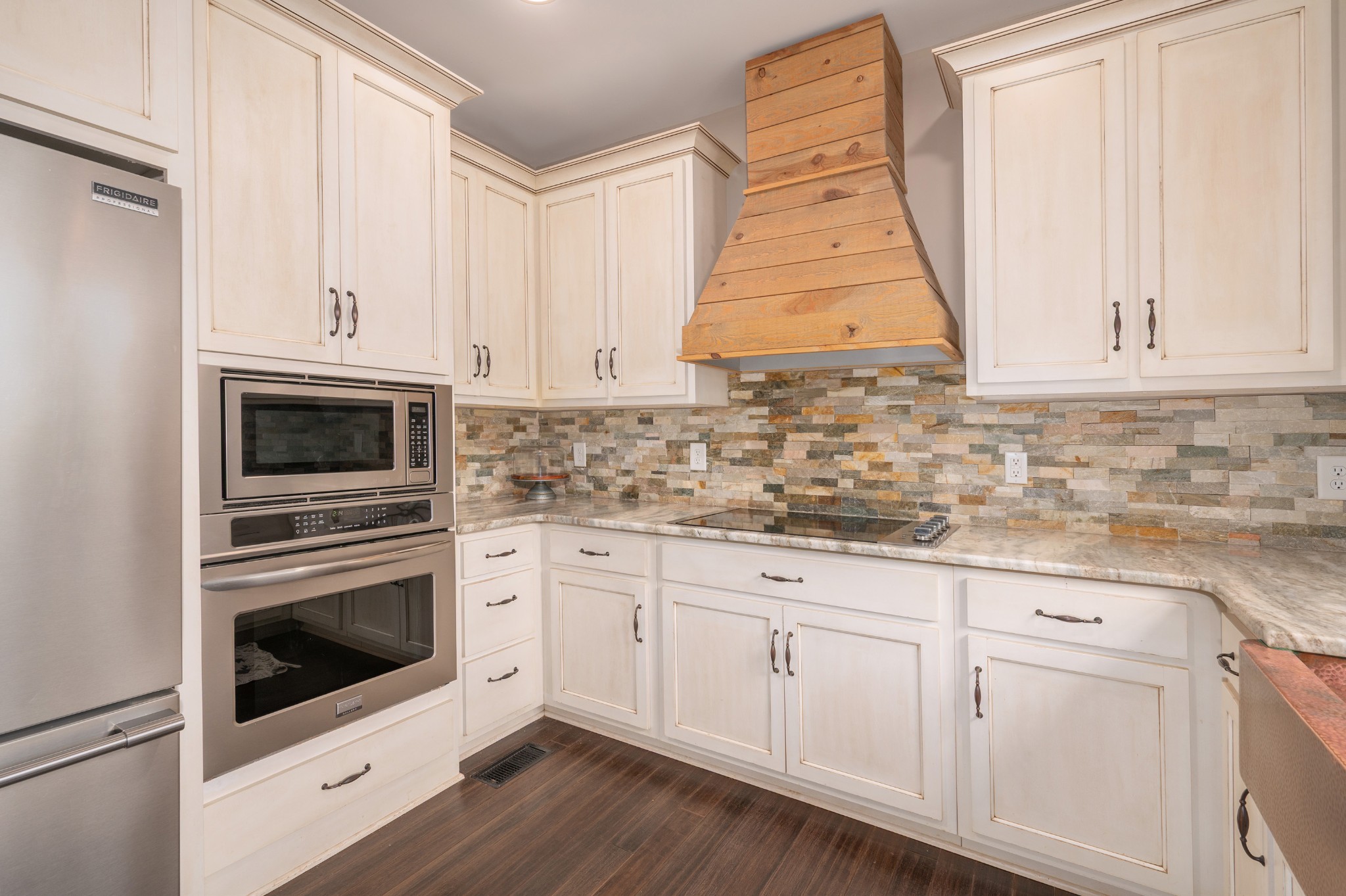 1675 Walnut Hill Road Lebanon, TN 37090 - Photo 14 of 54 a kitchen with white cabinets and white appliances