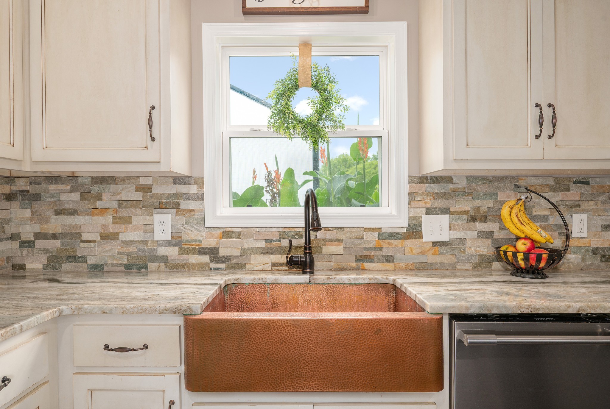 1675 Walnut Hill Road Lebanon, TN 37090 - Photo 15 of 54 a kitchen with granite countertop a sink window and cabinets