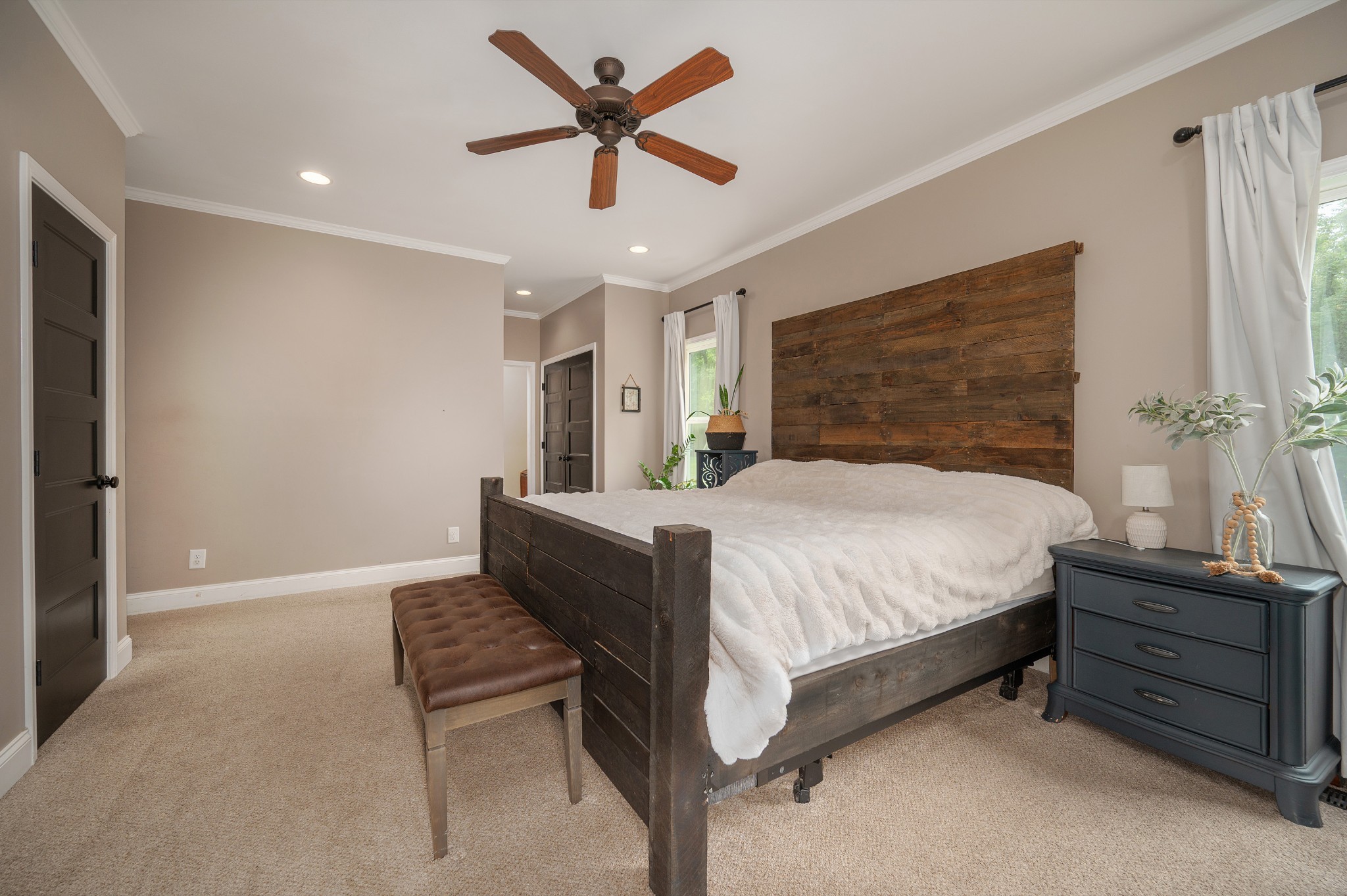 1675 Walnut Hill Road Lebanon, TN 37090 - Photo 20 of 54 a spacious bedroom with a bed and a chandelier