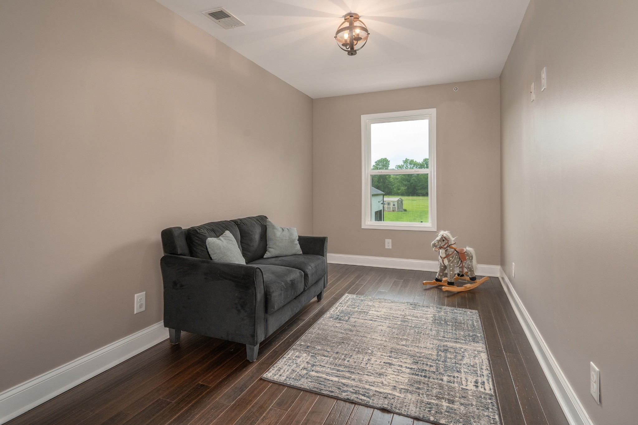 1675 Walnut Hill Road Lebanon, TN 37090 - Photo 24 of 54 a living room with furniture and a window