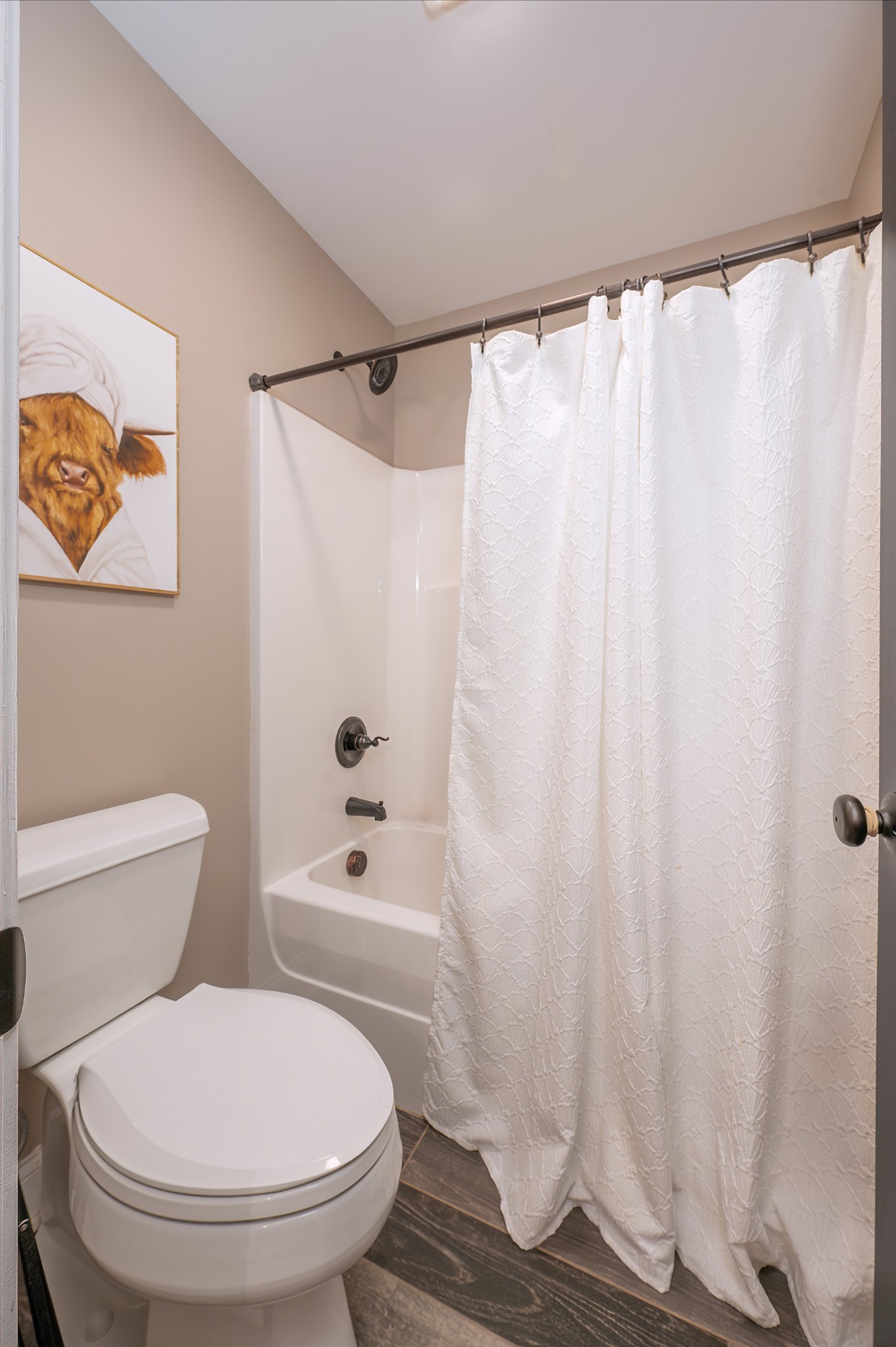 1675 Walnut Hill Road Lebanon, TN 37090 - Photo 28 of 54 a bathroom with a toilet and a shower curtain