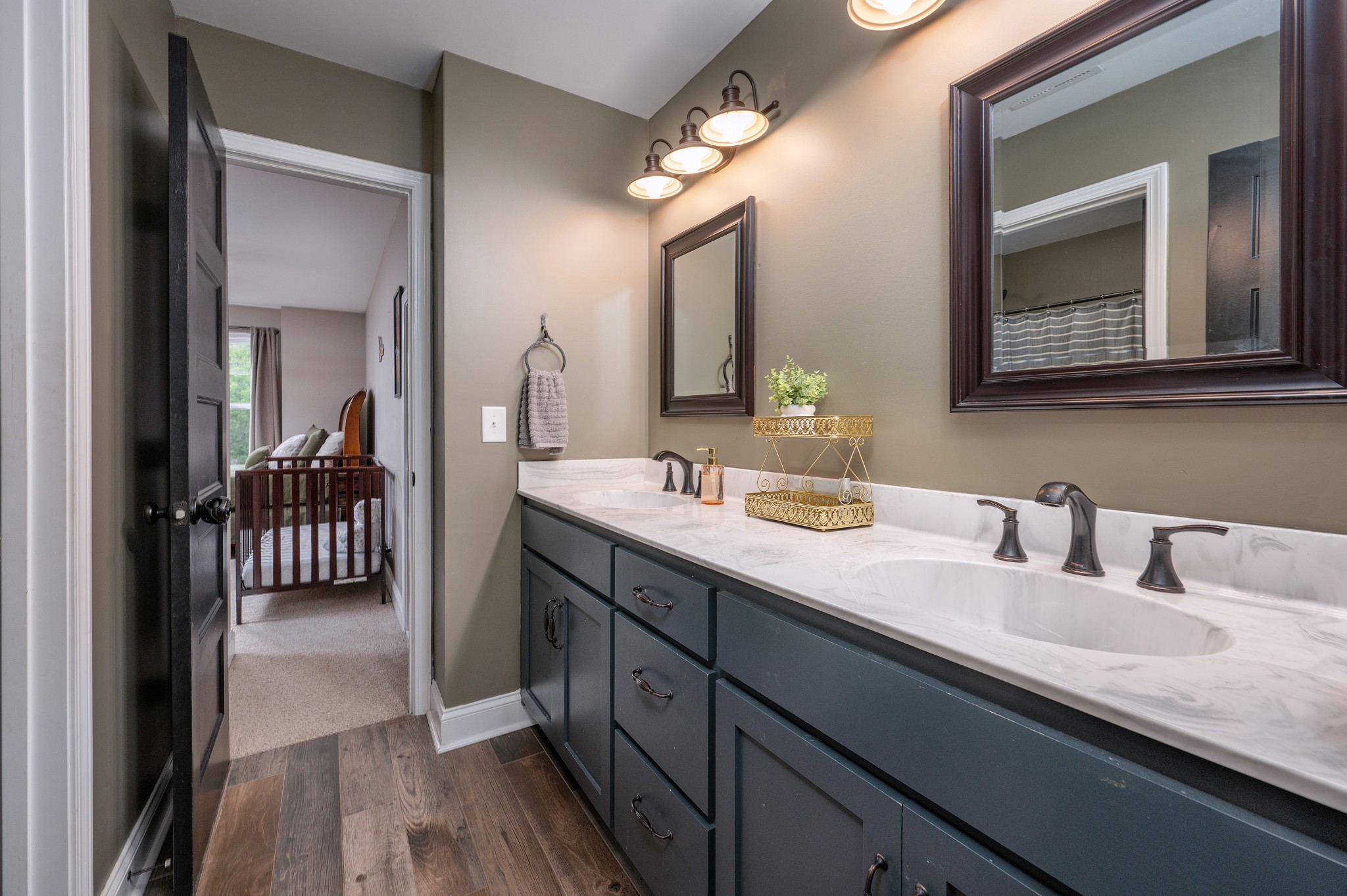 1675 Walnut Hill Road Lebanon, TN 37090 - Photo 31 of 54 a en suite bathroom with a granite countertop sink and a mirror