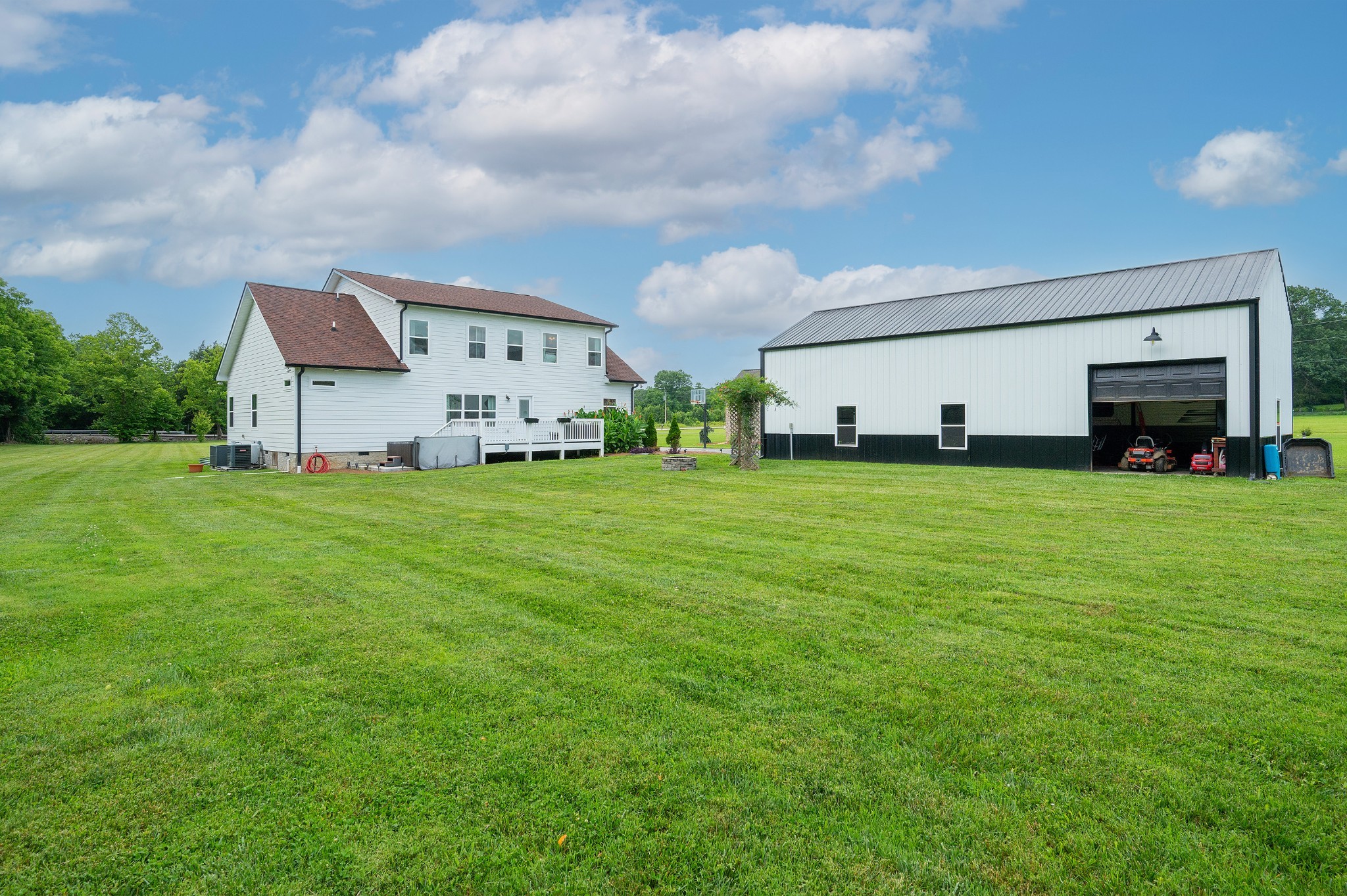 1675 Walnut Hill Road Lebanon, TN 37090 - Photo 4 of 54 a view of a house with a big yard and large trees