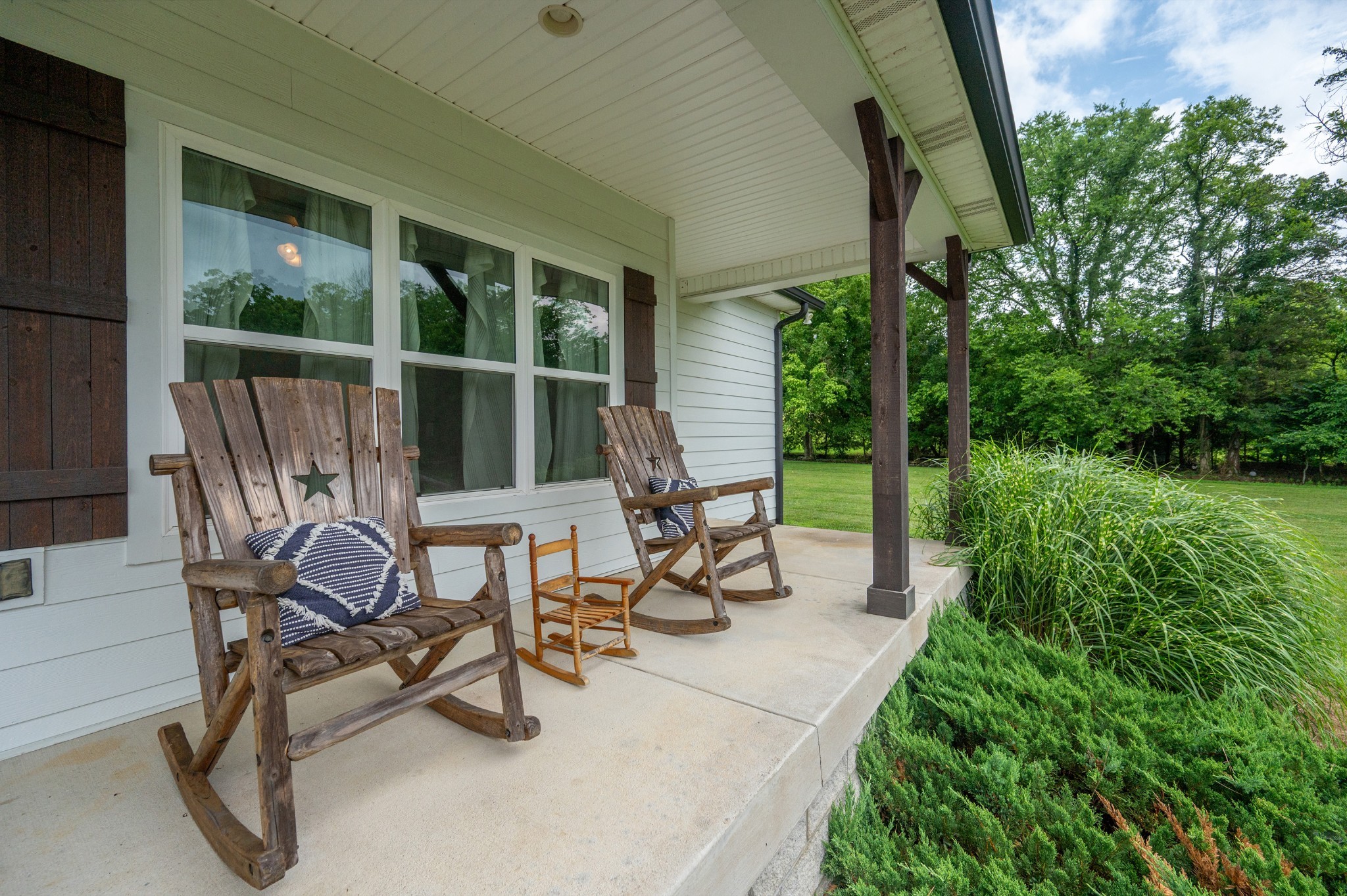 1675 Walnut Hill Road Lebanon, TN 37090 - Photo 51 of 54 a view of a porch with chairs and backyard