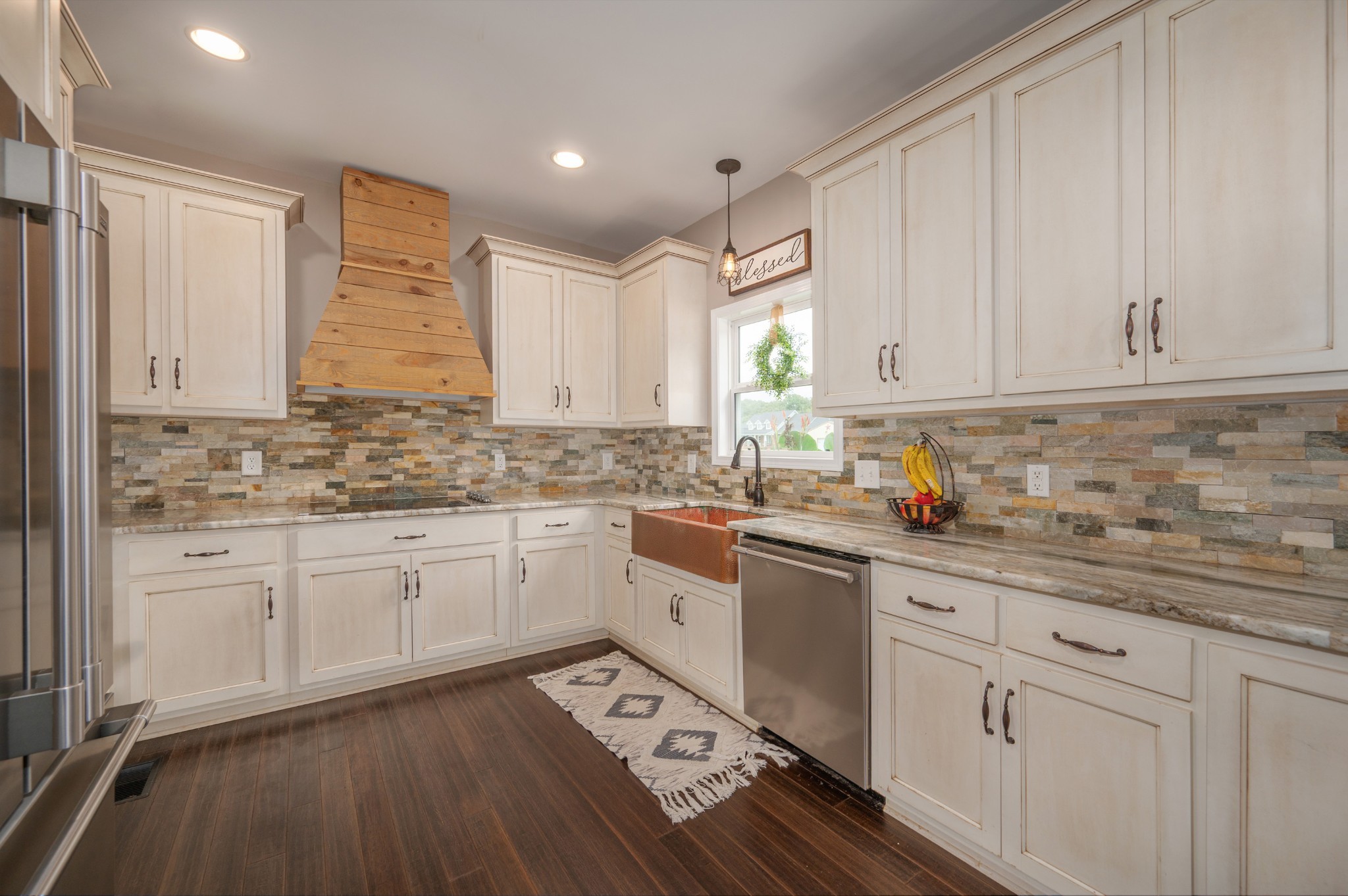 1675 Walnut Hill Road Lebanon, TN 37090 - Photo 6 of 54 a kitchen with granite countertop white cabinets white appliances and sink