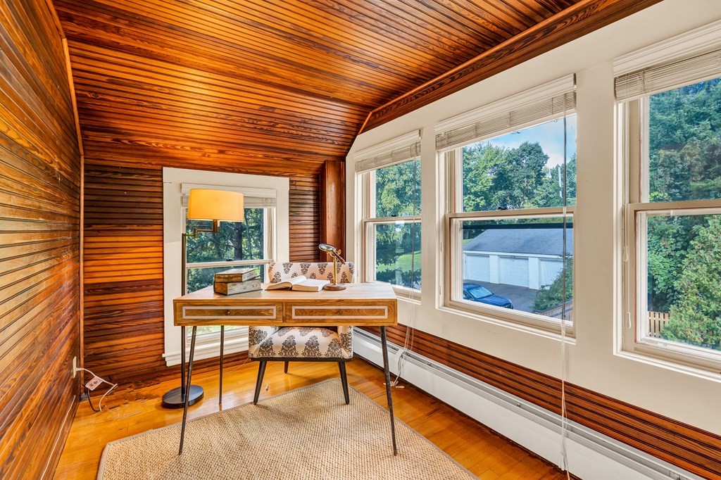 396 Plainfield Road, Unit 396 Concord, MA 01742 - Photo 21 of 24 a living room with furniture and a window