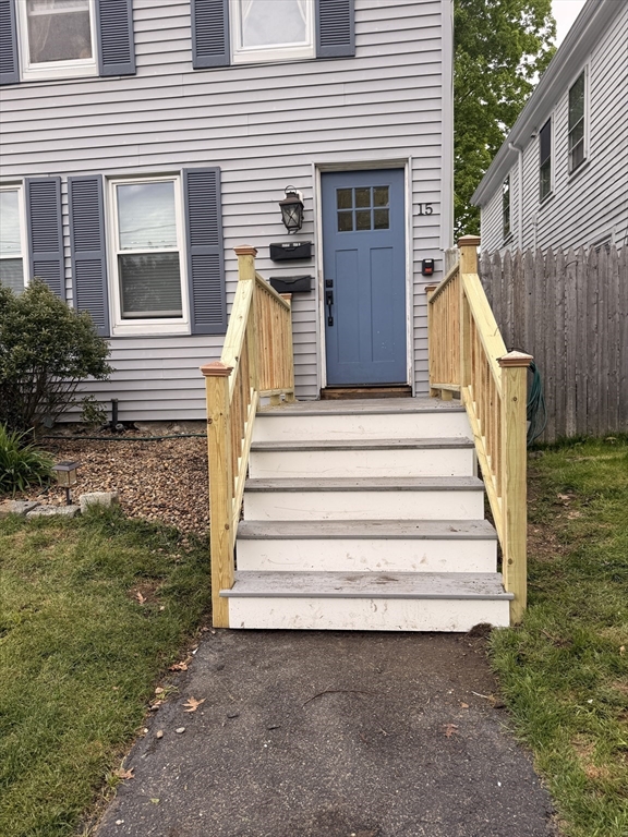 15 Central Street, Unit 4 Georgetown, MA 01833 - Photo 24 of 24 a view of a house with a yard and stairs