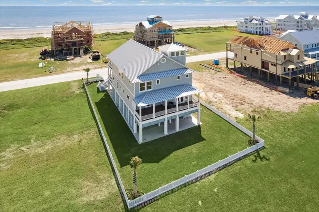 a view of a house with a ocean view