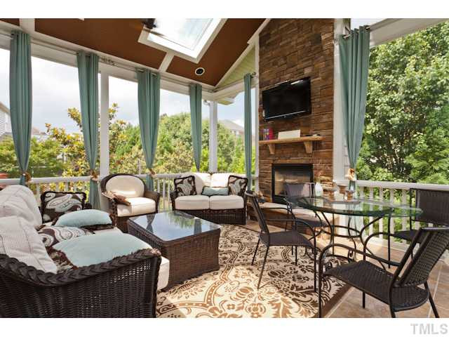 4004 Fenn Brook Lane Raleigh, NC 27613 - Photo 21 of 25 This Outdoor space is straight out of a magazine! Beautiful fireplace and skylights to soak in these beautiful NC afternoons. Screened Porch