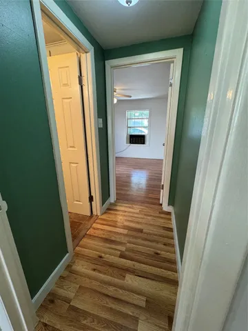 a bathroom with a toilet sink and shower