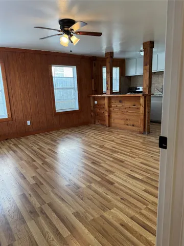 a view of a hallway with a chandelier