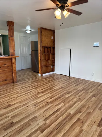 a view of a livingroom with a furniture