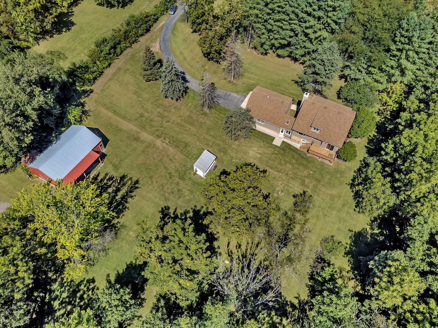 8816 Scott School Road Morris, IL 60450 - Photo 11 of 43 an aerial view of a house with a yard and lake view
