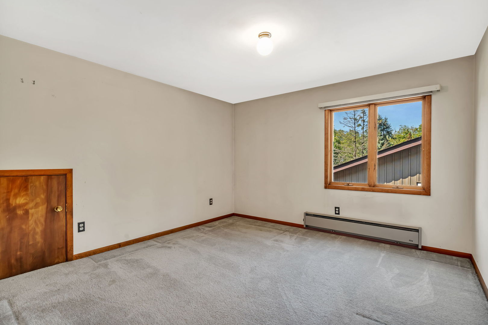 8816 Scott School Road Morris, IL 60450 - Photo 21 of 43 an empty room with windows