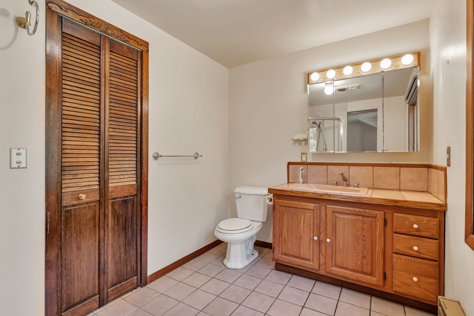 8816 Scott School Road Morris, IL 60450 - Photo 25 of 43 a bathroom with a toilet sink and mirror