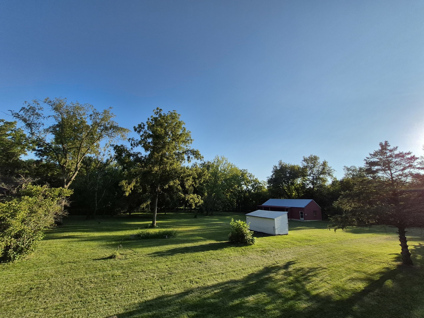 8816 Scott School Road Morris, IL 60450 - Photo 8 of 43 a big yard with swimming pool and green space