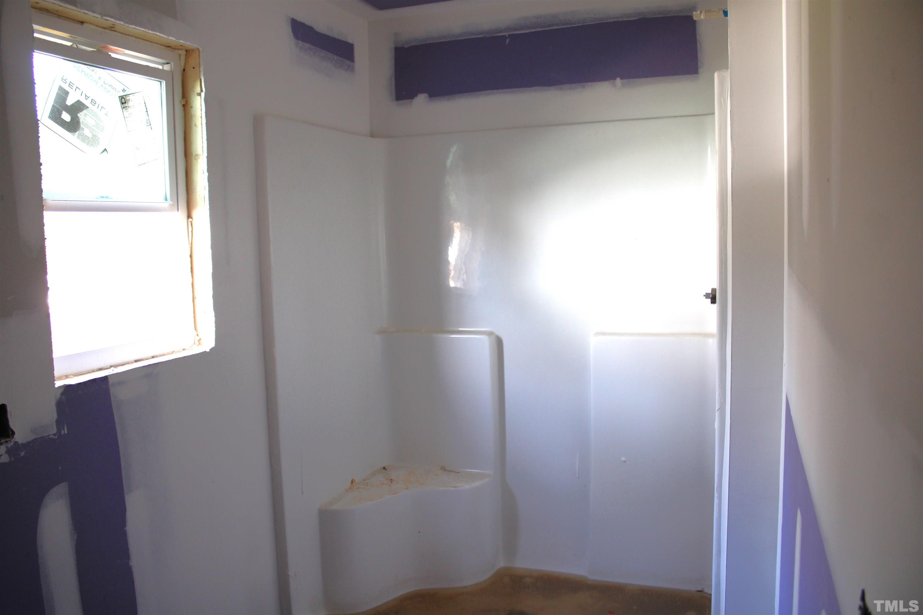110 Alcott Street Sanford, NC 27330 - Photo 17 of 20 a bathroom with a toilet
