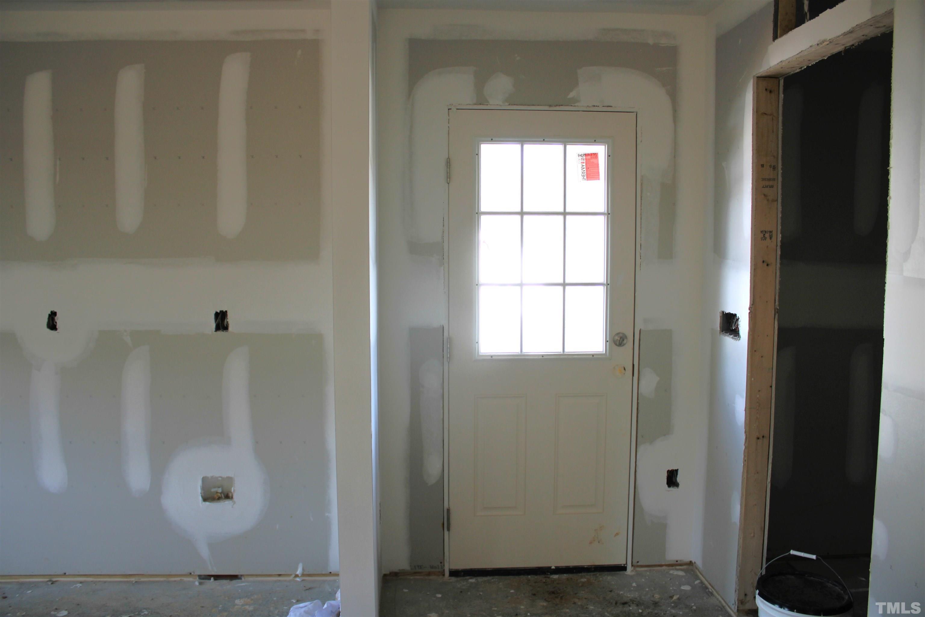 110 Alcott Street Sanford, NC 27330 - Photo 19 of 20 a bathroom with a glass door shower