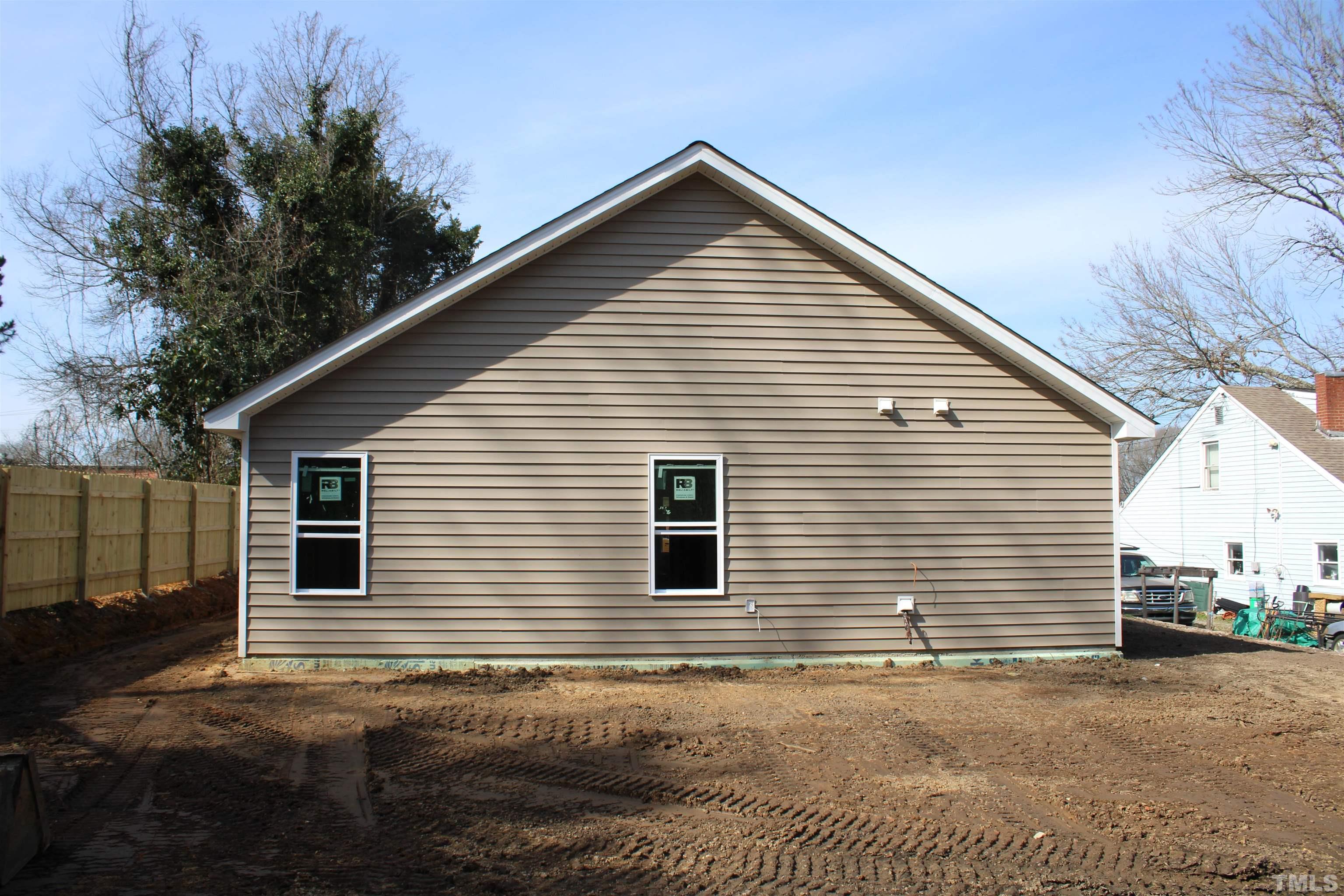110 Alcott Street Sanford, NC 27330 - Photo 2 of 20 a view of a house with a yard