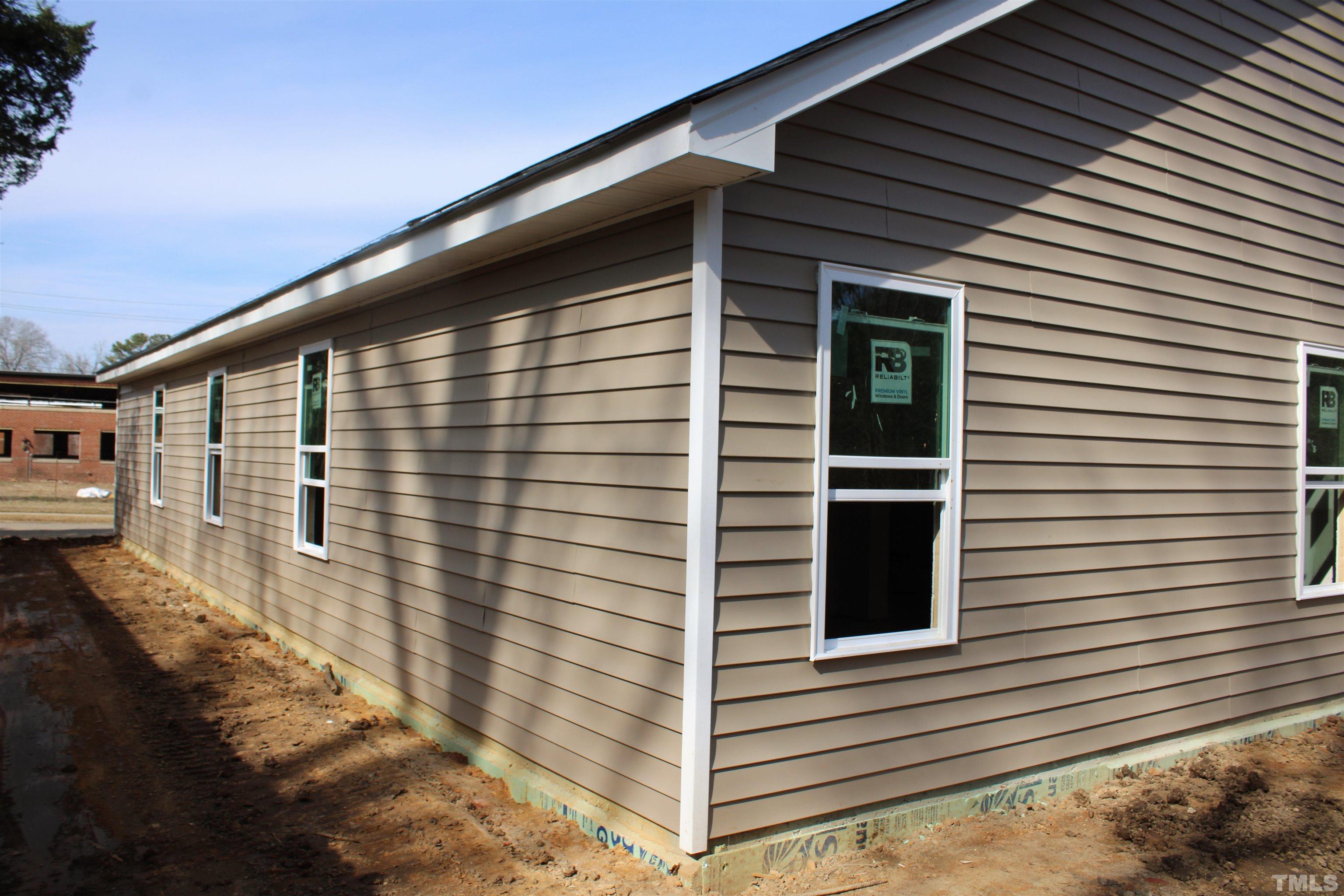 110 Alcott Street Sanford, NC 27330 - Photo 3 of 20 a view of a balcony with a door