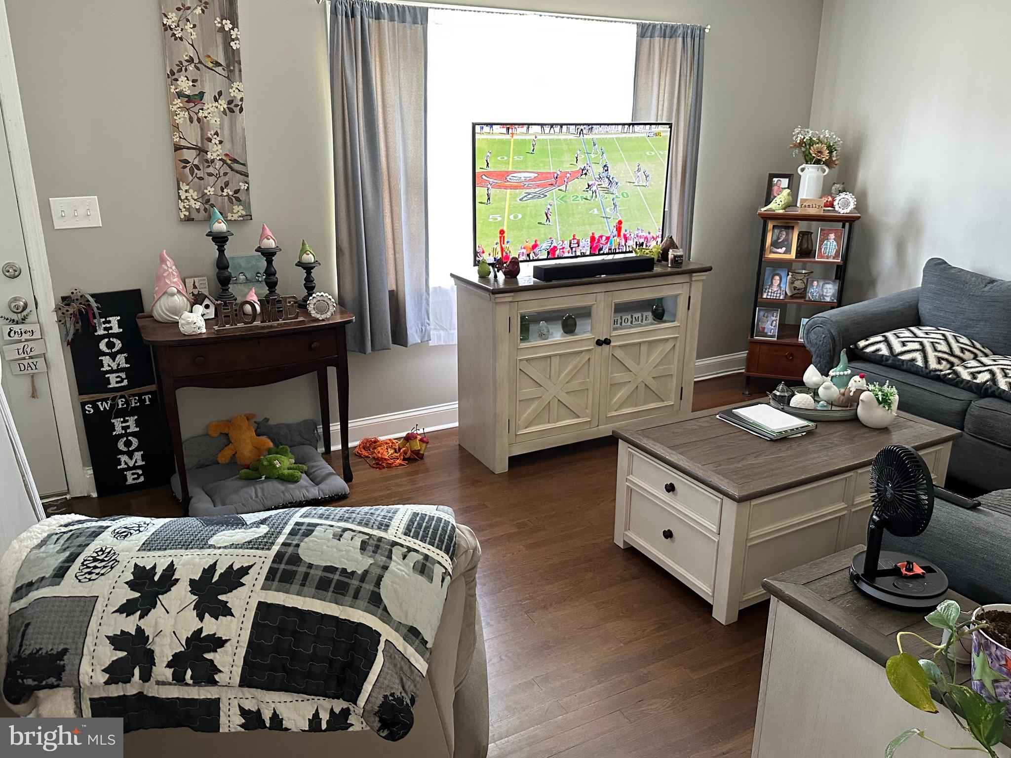 29 Petty Ridge Road Hamilton, NJ 08620 - Photo 12 of 47 a living room with furniture and a flat screen tv
