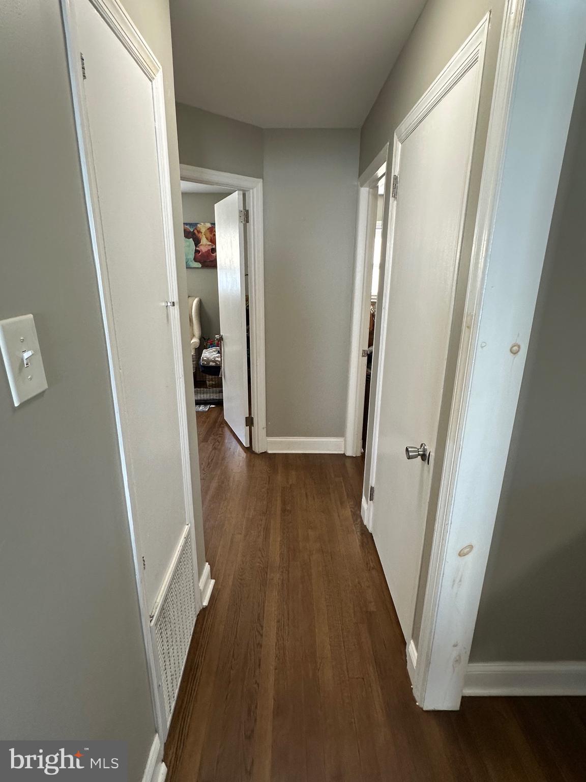 29 Petty Ridge Road Hamilton, NJ 08620 - Photo 23 of 47 a view of a hallway with wooden floor and staircase