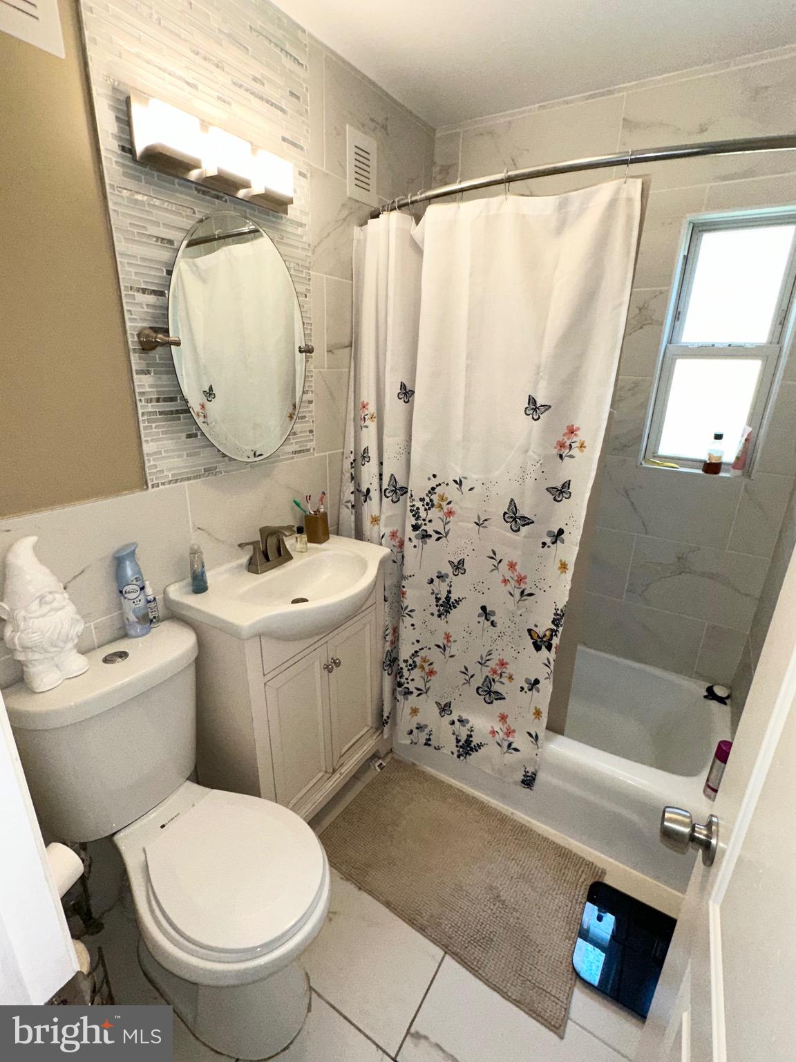 29 Petty Ridge Road Hamilton, NJ 08620 - Photo 24 of 47 a bathroom with a toilet sink and mirror