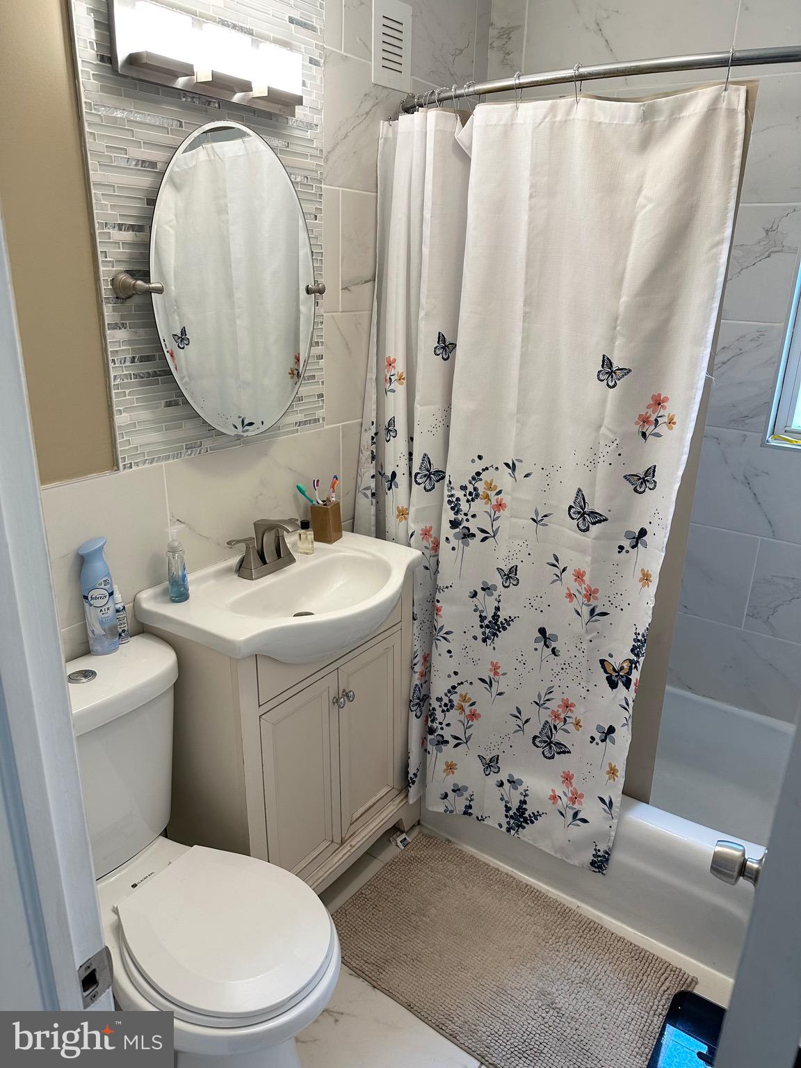 29 Petty Ridge Road Hamilton, NJ 08620 - Photo 25 of 47 a bathroom with a toilet sink and mirror