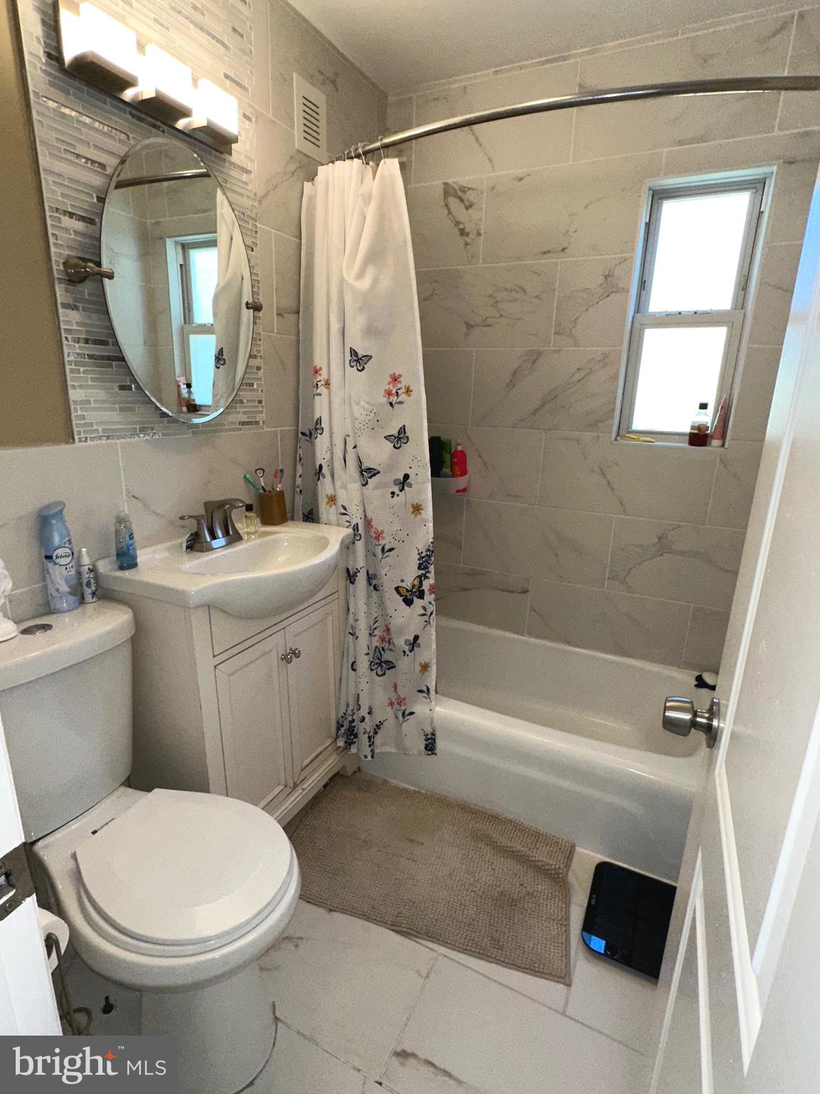 29 Petty Ridge Road Hamilton, NJ 08620 - Photo 26 of 47 a bathroom with a sink toilet and shower