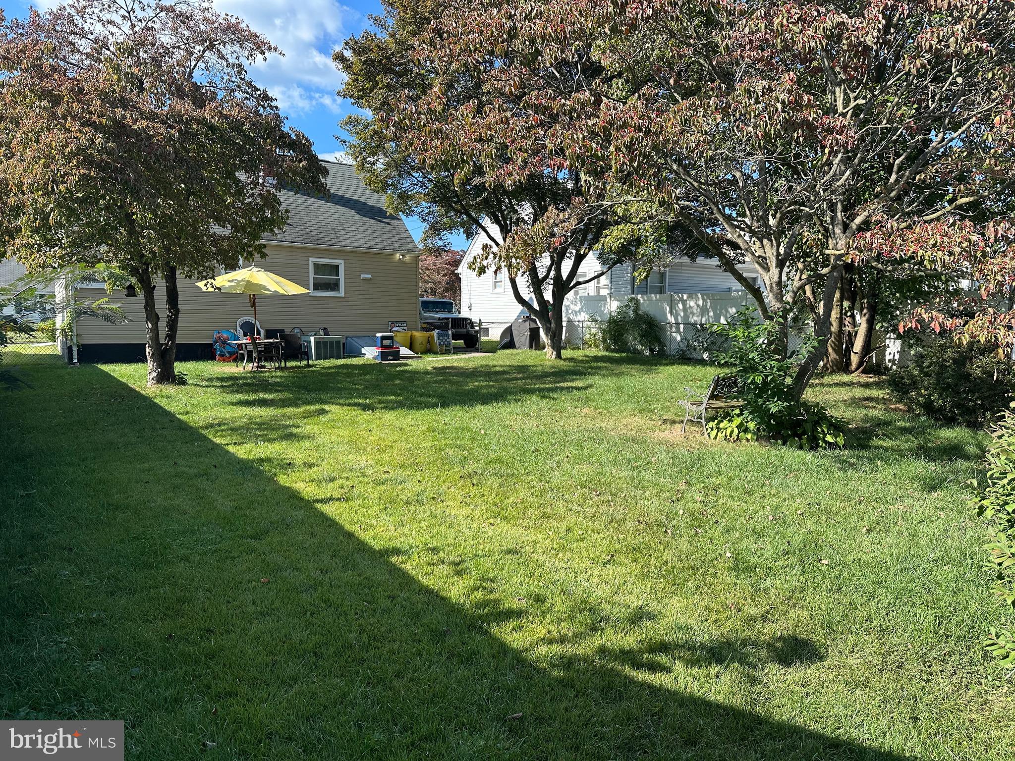 29 Petty Ridge Road Hamilton, NJ 08620 - Photo 46 of 47 a view of a house with a big yard and large trees