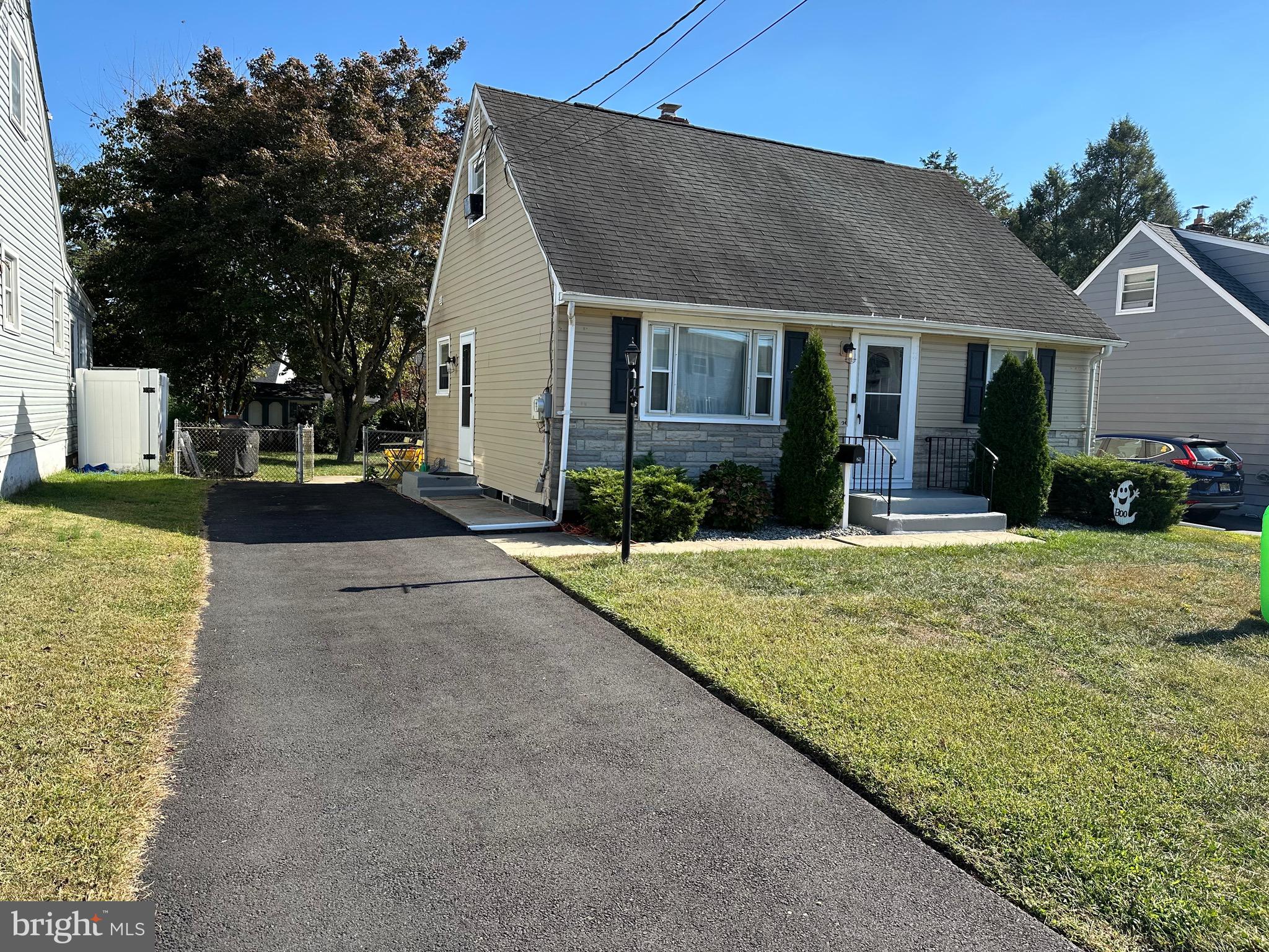 29 Petty Ridge Road Hamilton, NJ 08620 - Photo 8 of 47 a front view of a house with a yard and garage