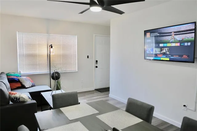 a living room with furniture and a window