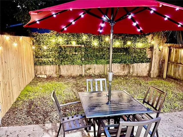 a view of swimming pool with seating area