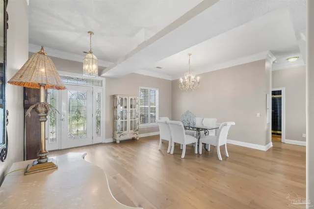 a kitchen with lots of counter top space and dining table