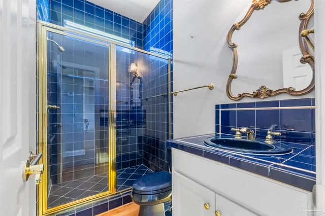 a swimming pool with outdoor seating and yard