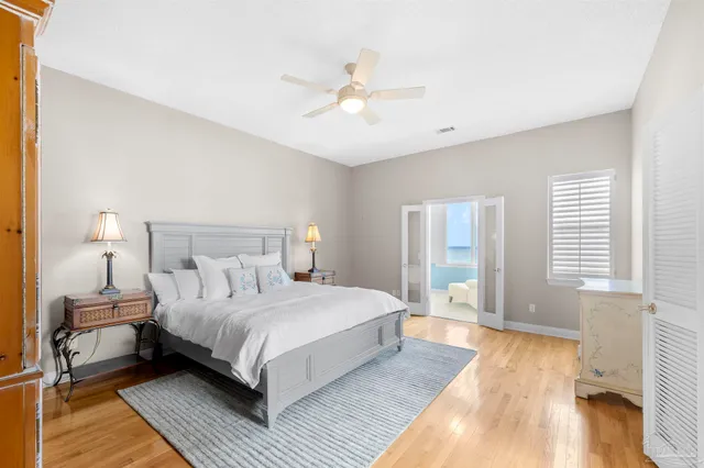 a view of a house with a yard and a fountain