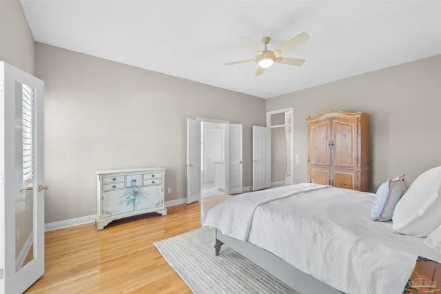 an aerial view of a house with a swimming pool outdoor seating and yard
